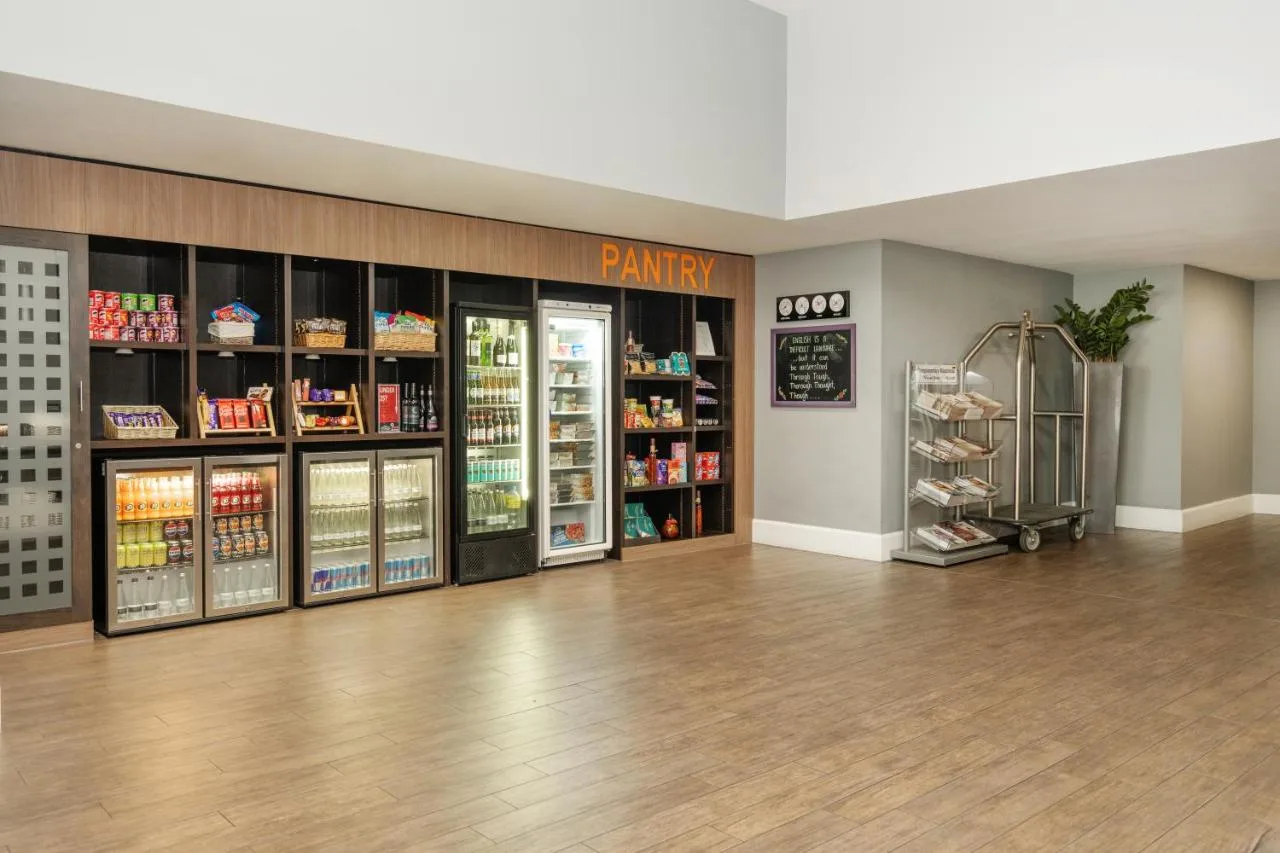 Kitchenette with fridges inside a suite near New Street Station